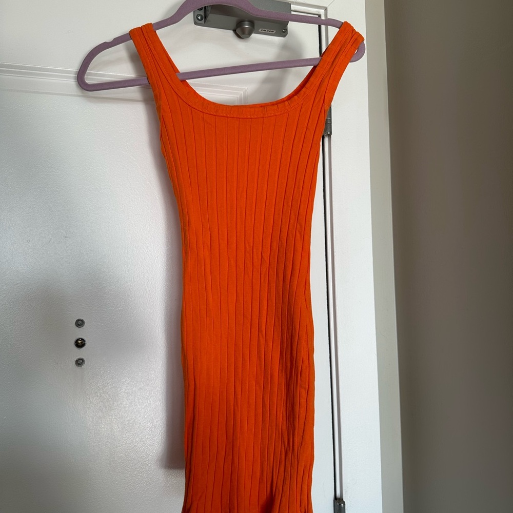 Women’s tight orange dress